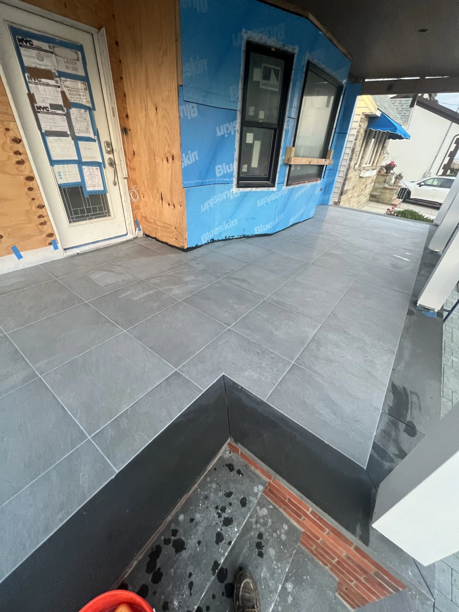 Porch exterior – Large Format Porcelain Tile on a bench House